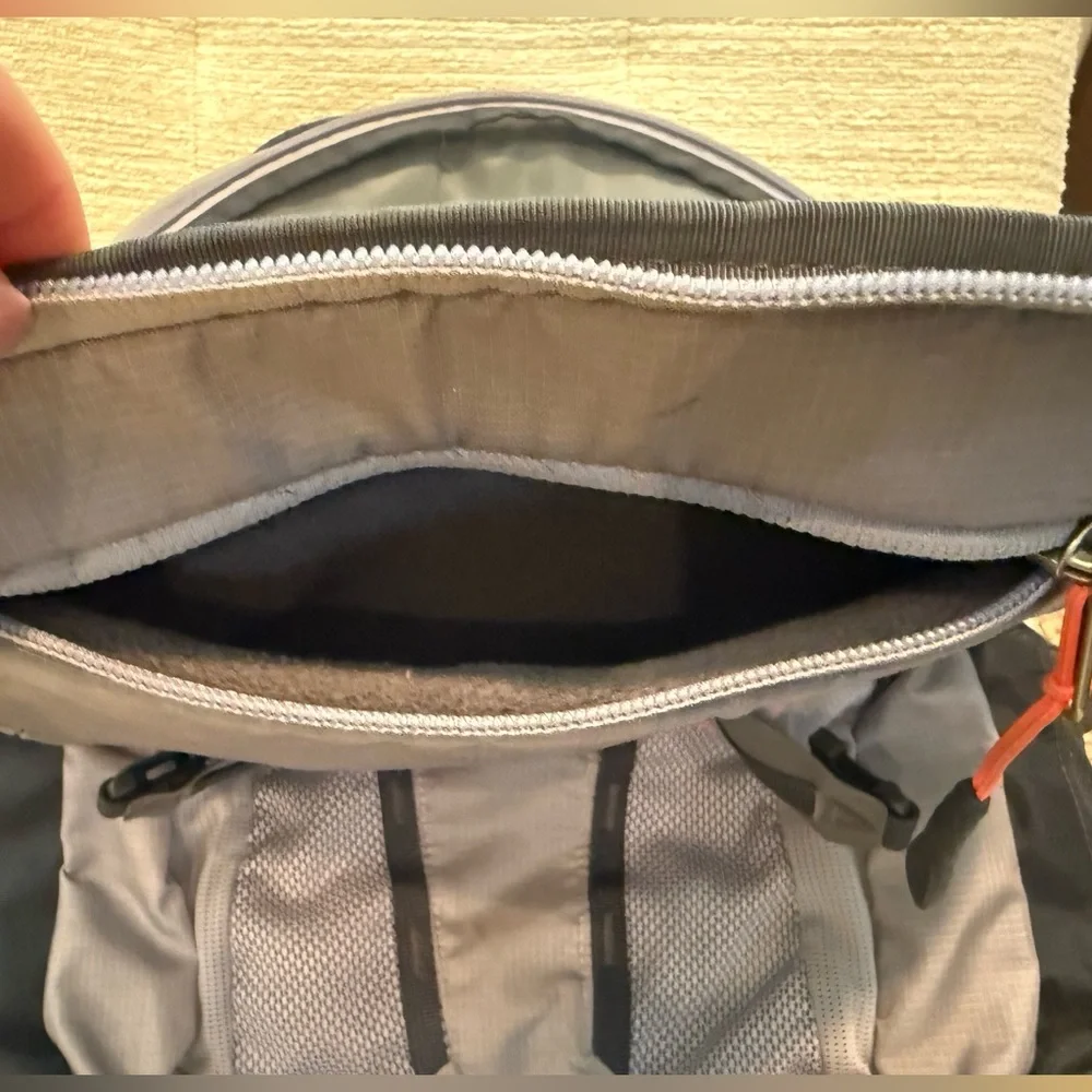The North Face Gray and Black Backpack with Orange Logo